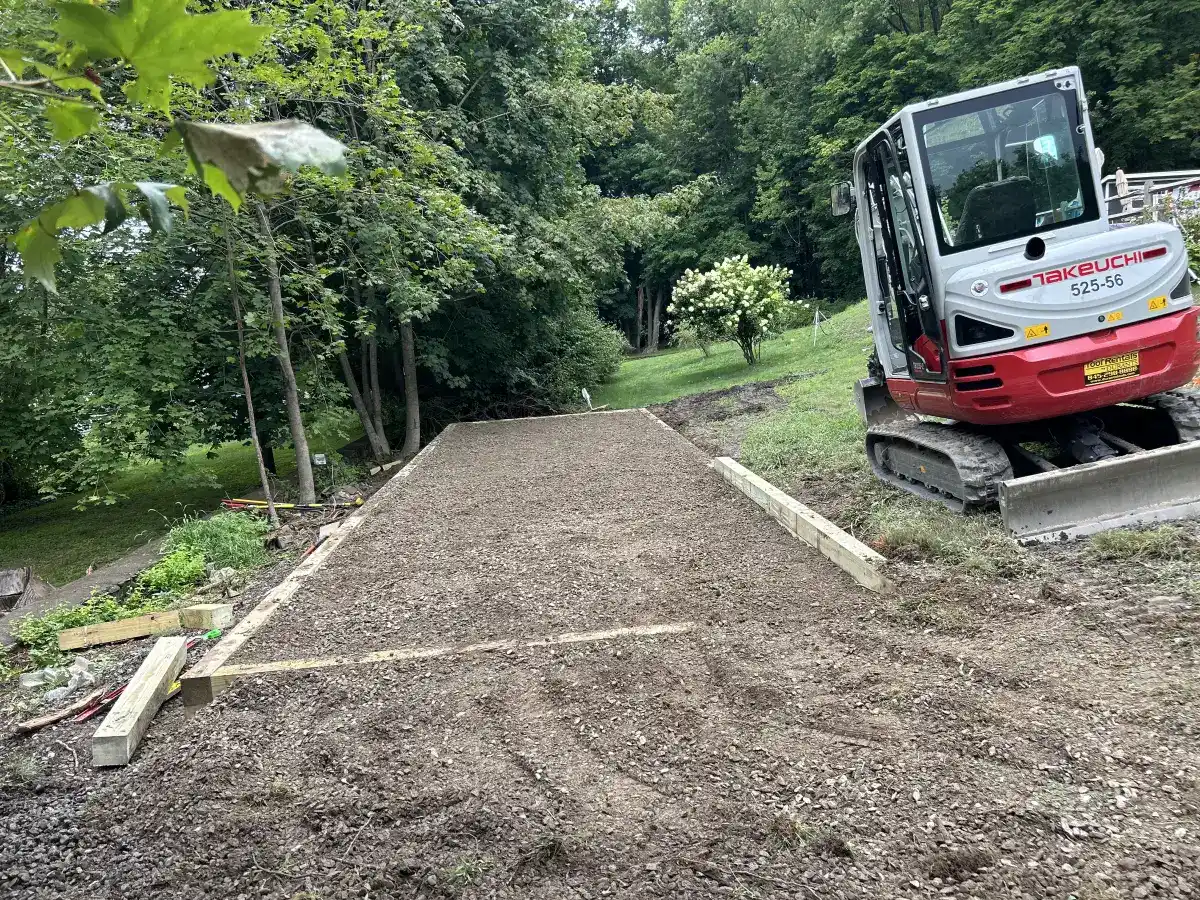 Takeuchi loader preparing walkway site