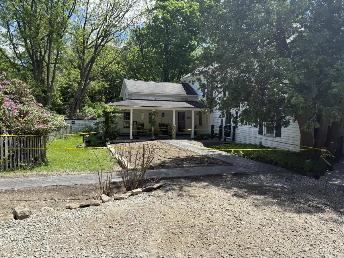 Freshly graded and compacted gravel driveway