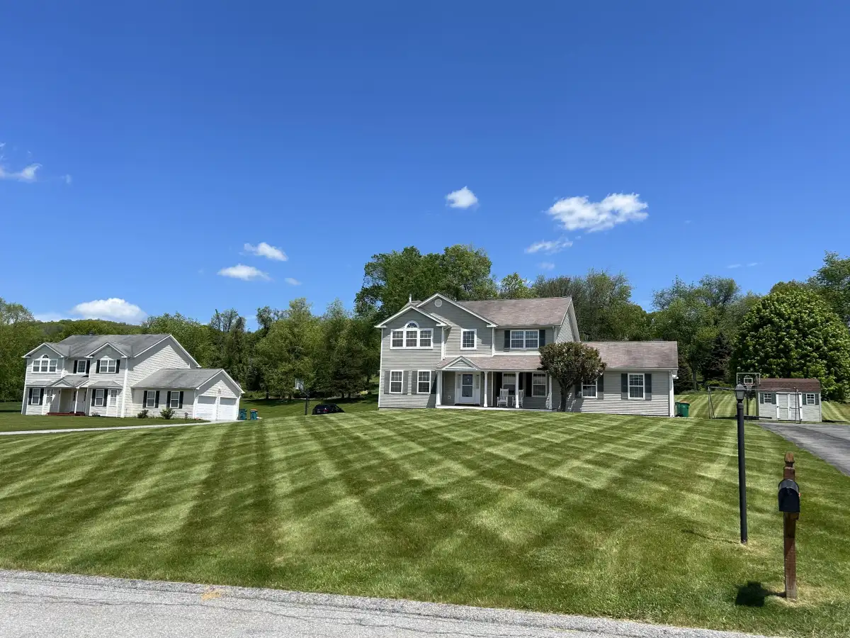 Freshly mowed lawn with crosshatch mowing pattern