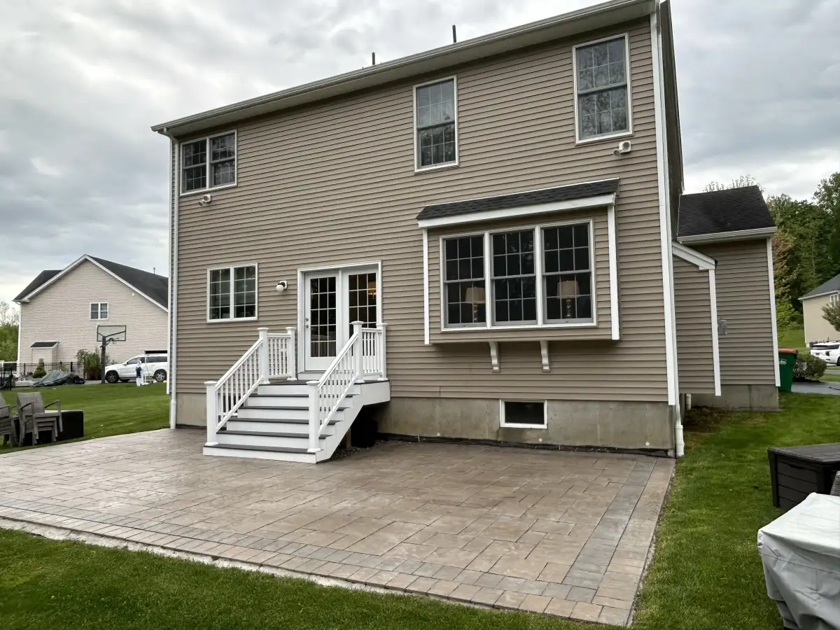 Stamped concrete patio in backyard setting