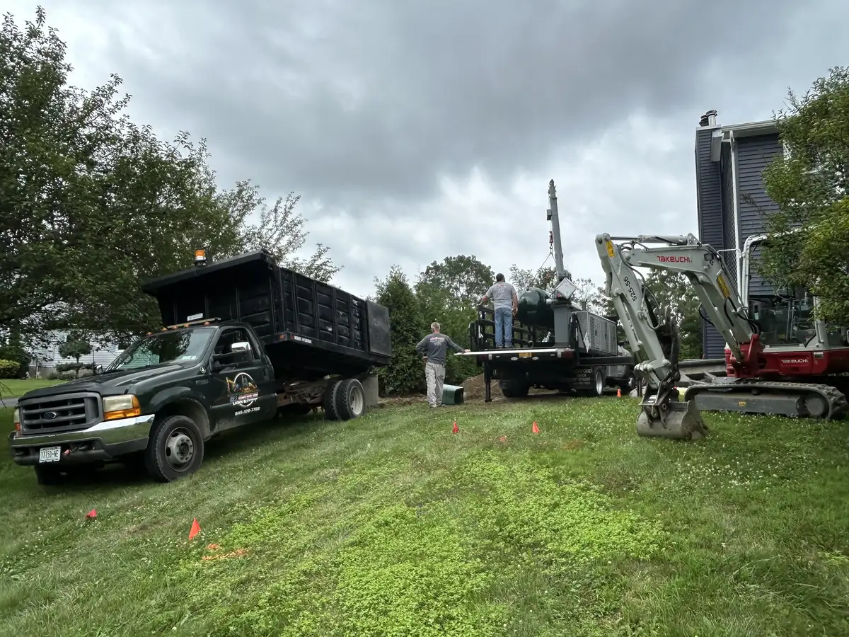 Propane tank placed in excavated bed