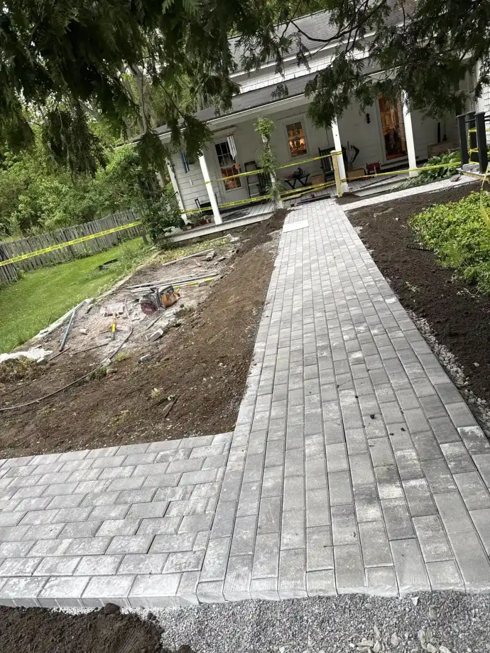 Finished retaining wall and fencing project in Dutchess County