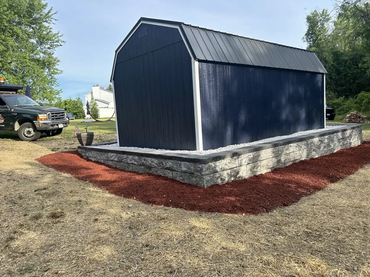 Stone veneer work on shed structure